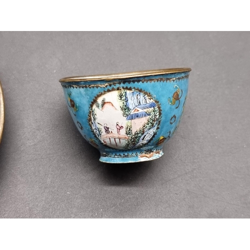 1254 - A small Chinese canton enamel wine bowl and saucer, 18th century, painted with landscape panels... 