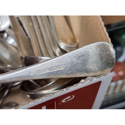 1297 - A collection of electroplated Old English pattern cutlery, each initialled 'E'.