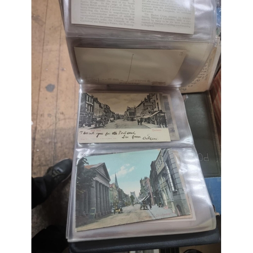 1309 - Postcards: an album of Chichester; together with another old album, to include World War I; and othe... 