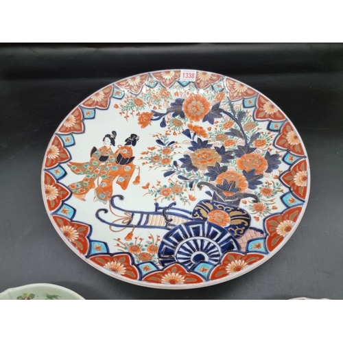 1338 - A Japanese Imari charger, 40.5cm diameter; together with another Japanese Imari scallop dish, 2... 