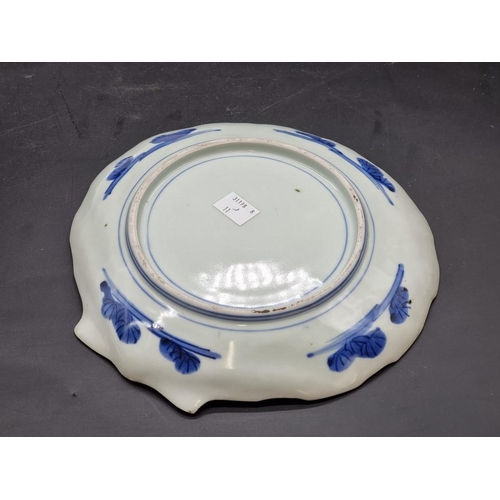 1338 - A Japanese Imari charger, 40.5cm diameter; together with another Japanese Imari scallop dish, 2... 