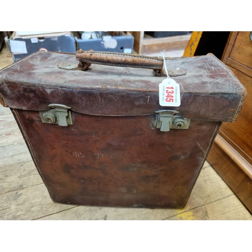 1345 - A vintage medical kit, in leather outer case, the contents possibly refitted.   ... 