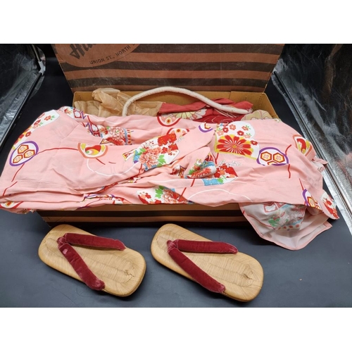 1353 - Costume: a vintage Japanese pink kimono or Yakata; with obi; and zori sandals.