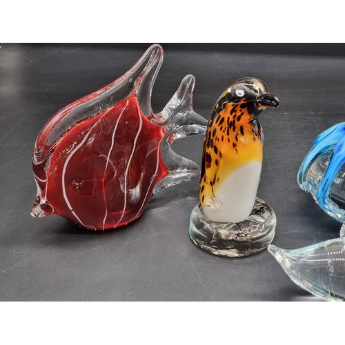 1358 - Ten clear and coloured glass animal and fish form glass paperweights, to include an octopus example,... 