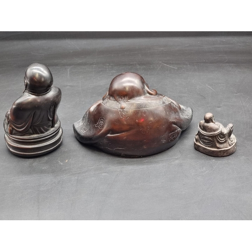 1362 - Three resin Buddhas, largest 13.5cm. 