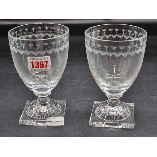 1367 - WITHDRAWN FROM SALE A pair of clear glass pedestal rummers, with engraved decoration to the rim, 13.... 