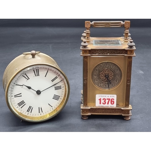 1376 - A gilt brass carriage timepiece, height including handle 15cm, with key; together with another brass... 