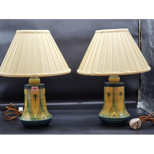 1381 - A pair of Jersey pottery table lamps, total height 48cm.