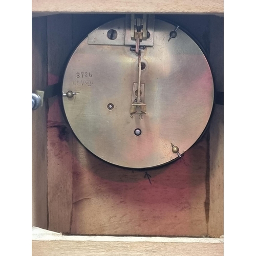 1384 - A late Victorian oak mantel clock, 25.5cm high, with pendulum.