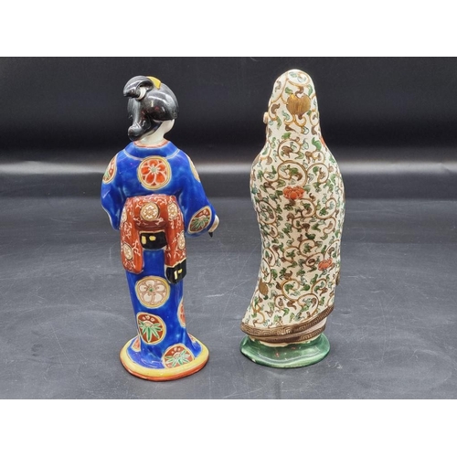 1404 - WITHDRAWN FROM SALE: Two Japanese porcelain figures, largest 28cm high.