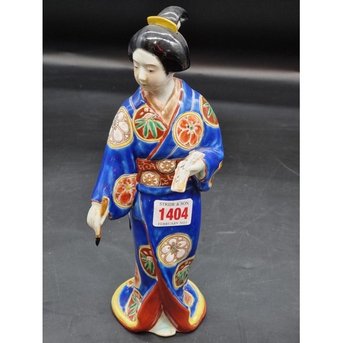 1404 - WITHDRAWN FROM SALE: Two Japanese porcelain figures, largest 28cm high.