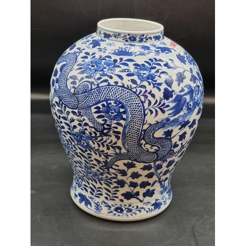 1409 - A large Chinese blue and white inverted baluster jar, painted with dragons, 19th century, Qianlang f... 