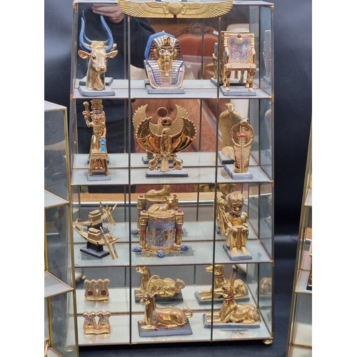 1412 - A collection of Franklin Mint 'Treasures of Tutankhamun', with certification, largest 12.5cm high; t... 