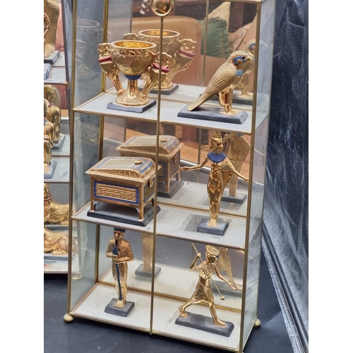 1412 - A collection of Franklin Mint 'Treasures of Tutankhamun', with certification, largest 12.5cm high; t... 