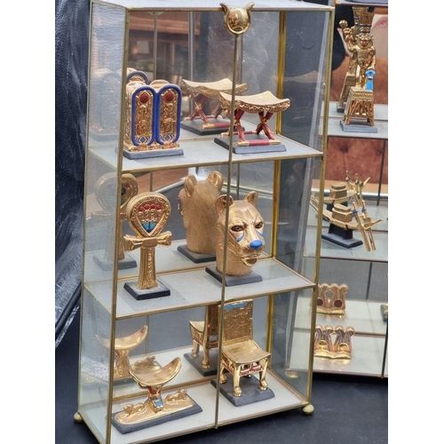 1412 - A collection of Franklin Mint 'Treasures of Tutankhamun', with certification, largest 12.5cm high; t... 