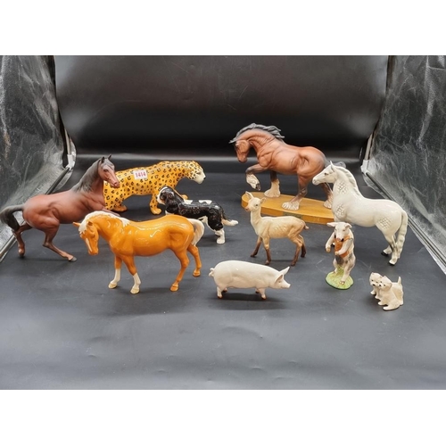 1414 - A collection of Beswick animals, to include a 'Spirit of Perth' horse. (10)