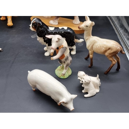 1414 - A collection of Beswick animals, to include a 'Spirit of Perth' horse. (10)