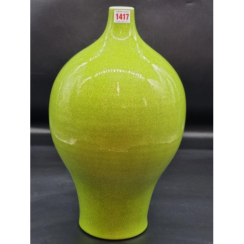 1417 - A large Chinese green monochrome vase, 43cm high.