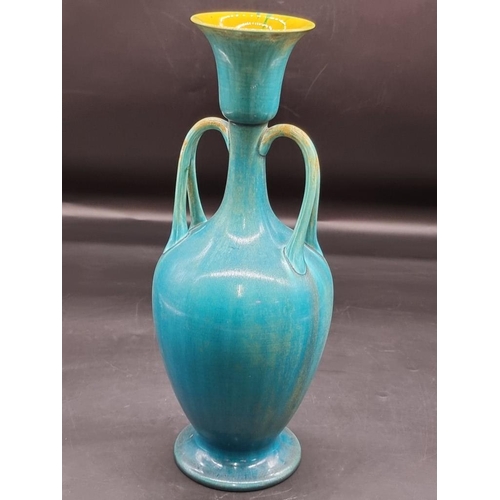 1418 - A Linthorpe twin handled turquoise glazed vase, impressed No.2141, 36cm high, (restoration... 