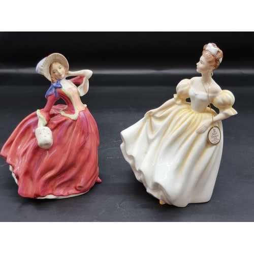 1422 - Seven Royal Doulton figures, to include: 'Miss Demure', HN1402, (hairline to base); 'Sweet Anne', HN... 