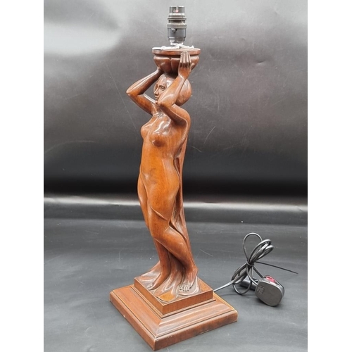 1426 - A good early 20th century carved walnut figural table lamp, height excluding fitting  48cm.&nbs... 