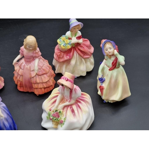 1430 - Fourteen Royal Doulton figures, to include three Dickens examples. (14)