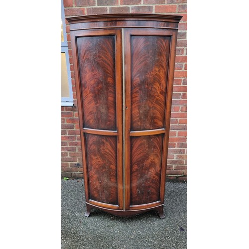 1616 - An early 20th century mahogany bowfront hall robe, 175.5cm high x 81cm wide x 58cm deep.... 