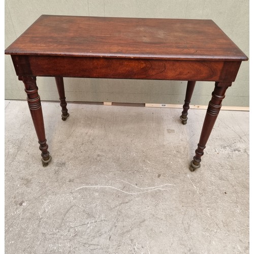 1622 - A 19th century mahogany rectangular centre table, on brass casters, 95cm wide; together with a Georg... 