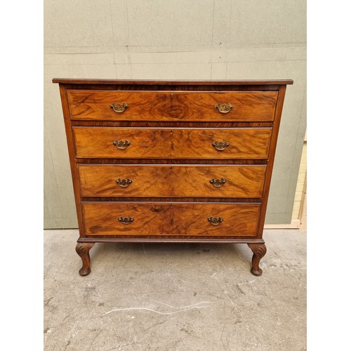 1626 - A 1930s figured walnut chest of drawers, 110cm high x 106.5cm wide.