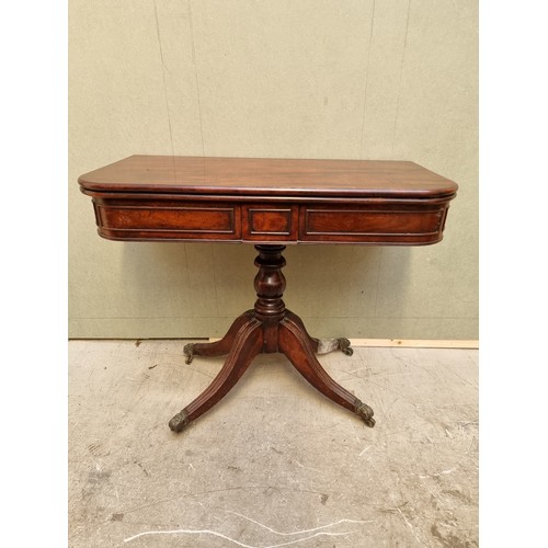 1628 - A George IV mahogany card table, 88cm wide. (break to leg).