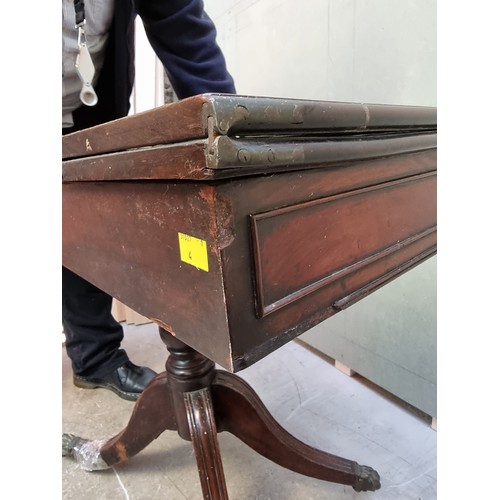 1628 - A George IV mahogany card table, 88cm wide. (break to leg).