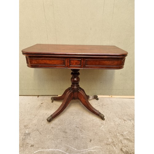 1628 - A George IV mahogany card table, 88cm wide. (break to leg).