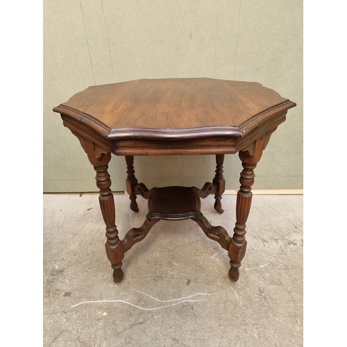 1631 - An Edwardian walnut octagonal occasional table, 79cm diameter.