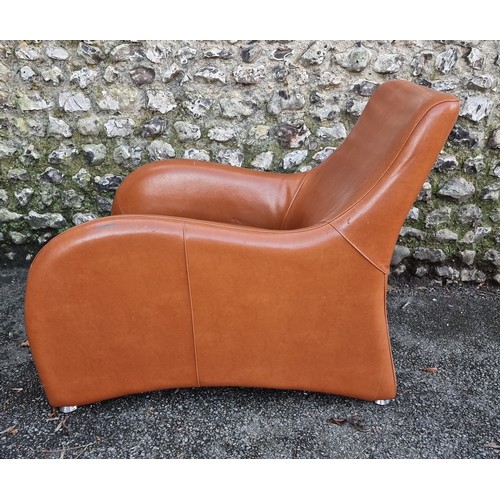 1651 - A modern leatherette chair and stool, (surface wear).