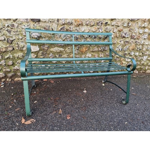 1646 - A green painted wrought iron bench, 117cm wide.