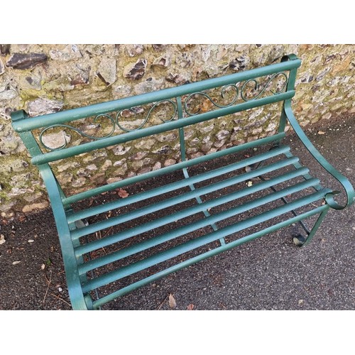 1646 - A green painted wrought iron bench, 117cm wide.