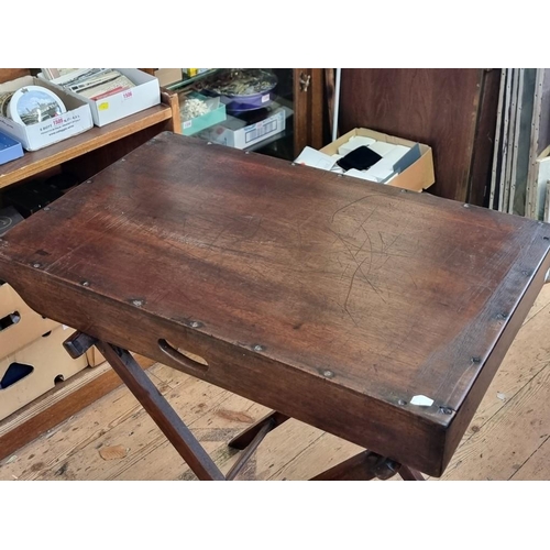 1097 - A George III mahogany butler's tray, 78cm wide, on folding stand.