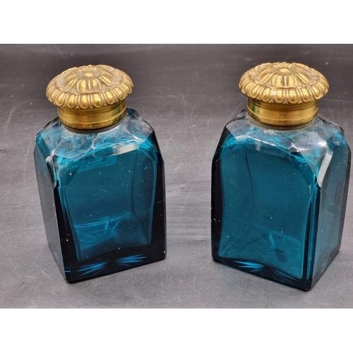 1462 - A pair of Georgian green glass and gilt brass scent bottles, 11cm high.