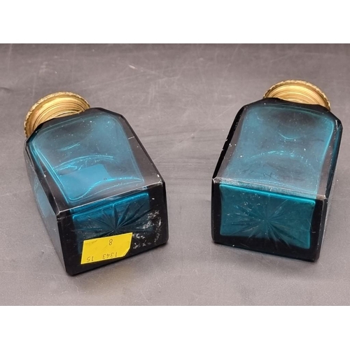 1462 - A pair of Georgian green glass and gilt brass scent bottles, 11cm high.