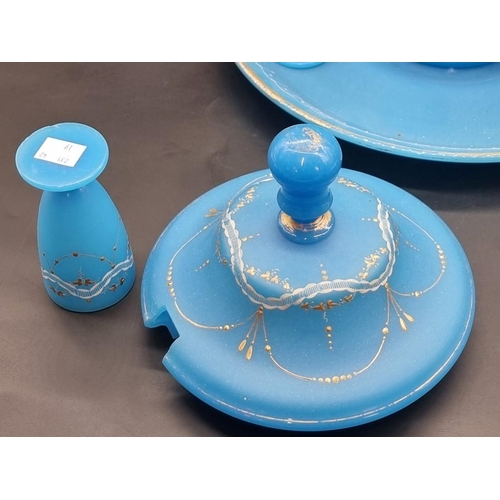 1466 - A late 19th century opaque blue glass punch set, comprising: a bowl and cover, 29.5cm high; stand; l... 