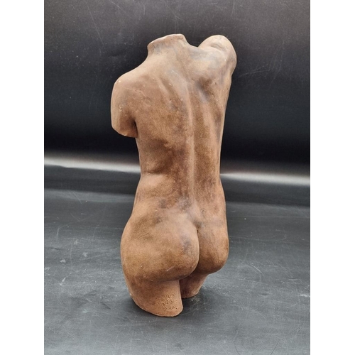 1471 - Reuben Ugbine, (Nigerian 1956- 2021), a ceramic female torso, signed and dated 2002, 29cm high.... 