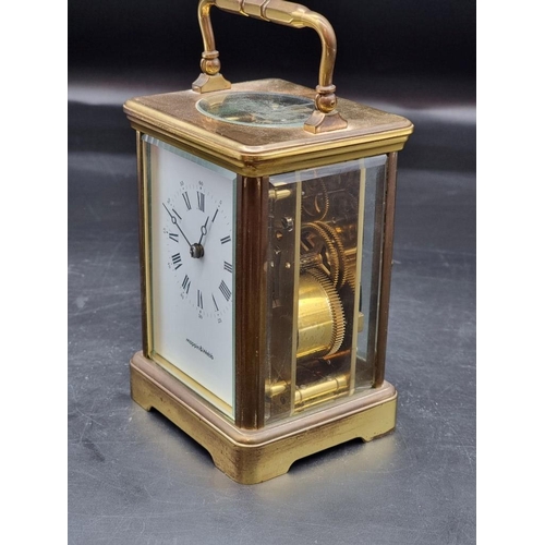 1472 - An old brass carriage clock, by Mappin & Webb, striking on a gong, height including handle 17.5c... 