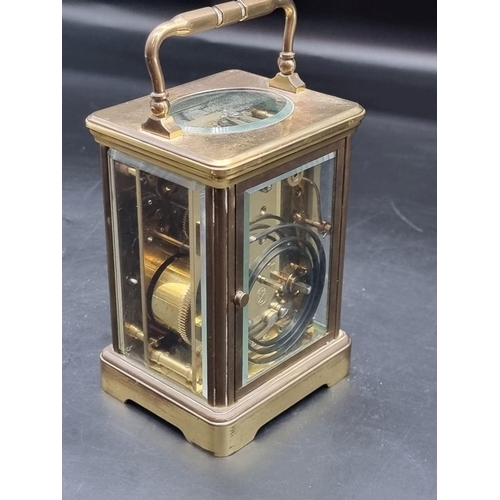 1472 - An old brass carriage clock, by Mappin & Webb, striking on a gong, height including handle 17.5c... 