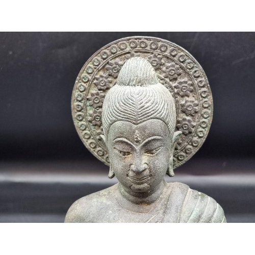 1475 - A Sino Tibetan copper alloy Buddha, 18th/19th century, 27.5cm high. 