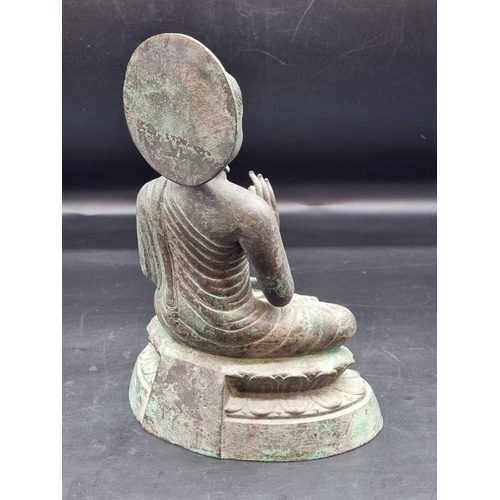 1475 - A Sino Tibetan copper alloy Buddha, 18th/19th century, 27.5cm high. 