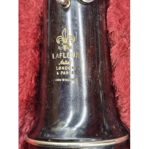 1485 - A Lafleur oboe, in fitted case.