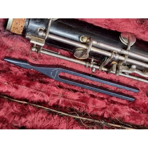 1485 - A Lafleur oboe, in fitted case.