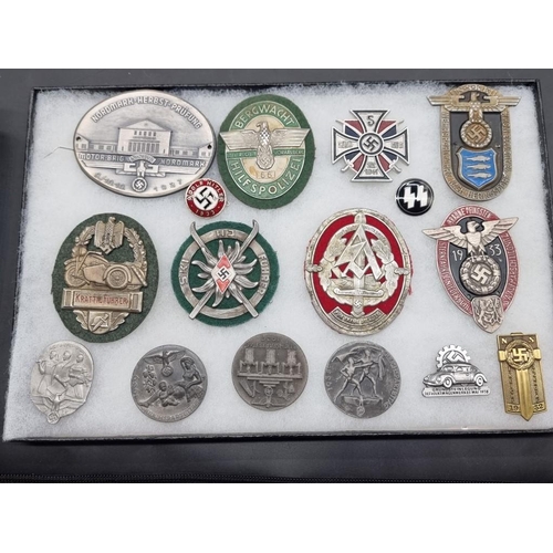 1488 - A collection of German Third Reich medals and badges, to include a large number of reproductions, in... 