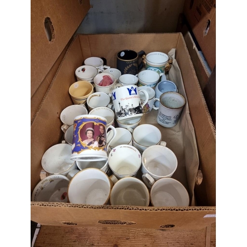 1508 - A large collection of Royal Commemorative mugs, mostly Elizabeth II. (four trays)... 