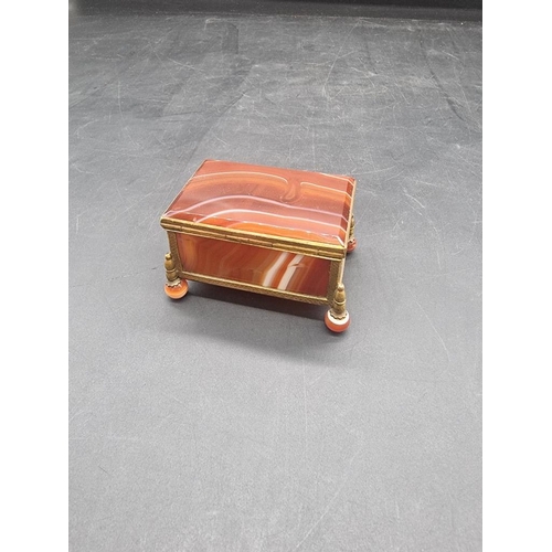 1511 - An antique banded agate and gilt brass mounted casket, 7cm wide. 